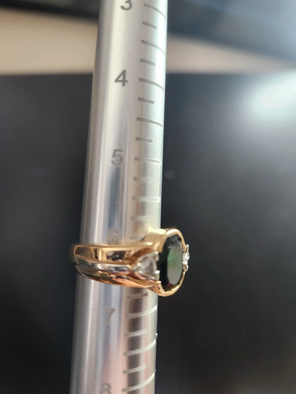 Gold Ring with Deep Green Tourmaline Stone and Trillion Diamond Accents